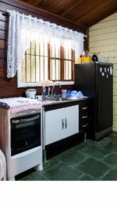 Nhà bếp/bếp nhỏ tại Boiçucanga litoral Norte