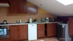 Kuchnia lub aneks kuchenny w obiekcie Apartament w domu na wsi