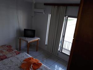 Μια τηλεόραση ή/και κέντρο ψυχαγωγίας στο HOTEL PINOTTI LTDA