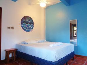 Кровать или кровати в номере Livingston Resort Hotel