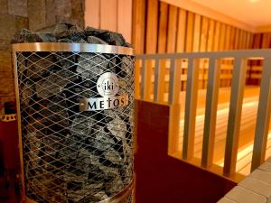 Postel nebo postele na pokoji v ubytování Sauna & Capsule AMZA (mens only)