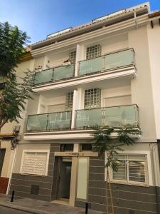 a building with balconies on the side of it at Apartment Los Boliches Fuengirola Malaga Spain in Fuengirola