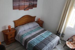 ランポーヤにあるAlojamiento rural Masía Valldepérezのベッドルーム(キルト付きのベッド付) +39枚の写真