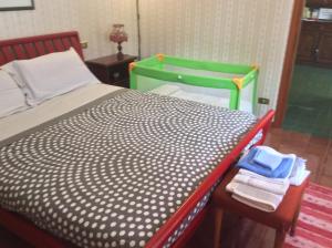 Postel nebo postele na pokoji v ubytování il nido nella quiete