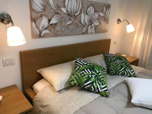 A bed or beds in a room at GiorGiada Relax