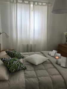 A bed or beds in a room at GiorGiada Relax