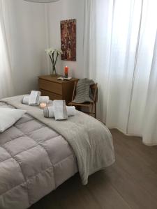A bed or beds in a room at GiorGiada Relax