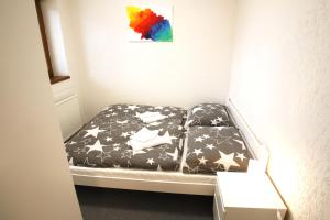 Postel nebo postele na pokoji v ubytování Apartmány Paseky - Jablonec nad Nisou
