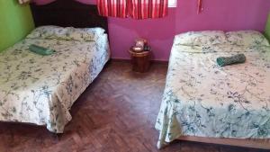 Posteľ alebo postele v izbe v ubytovaní Mi Cuartito en Bacalar