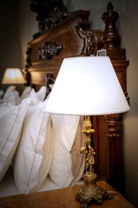 Cama ou camas em um quarto em Nino Hotel Boutique