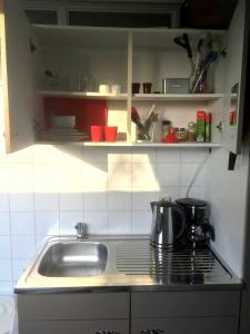 Kuchyň nebo kuchyňský kout v ubytování 't Zeeuwse licht