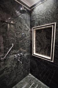 Um banheiro em Nino Hotel Boutique
