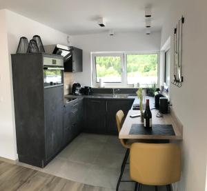 Kuchyň nebo kuchyňský kout v ubytování Penthouse Lebierre