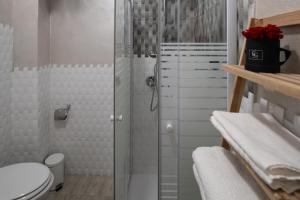 Kúpeľňa v ubytovaní Ortigia Terrace Sea View + 21 fotografií
