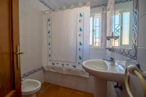 Kúpeľňa v ubytovaní Chalet adosado Atalaya P