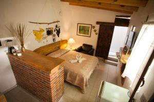 Postel nebo postele na pokoji v ubytování Htl & Villas Las Glorias Mazamitla, céntricas, parking, jardín