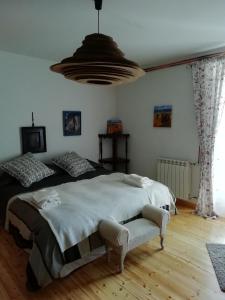 Łóżko lub łóżka w pokoju w obiekcie La Casona de Doña Clotilde