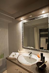 Bathroom sa CGH Résidences & Spas les Chalets du Soleil Authentiques