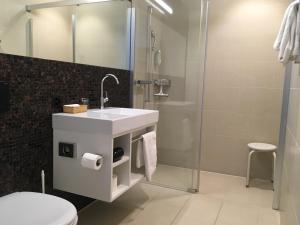 Koupelna v ubytování Hotel Flawil