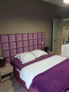 Ένα ή περισσότερα κρεβάτια σε δωμάτιο στο La Papillote