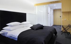 Cama o camas de una habitación en Hotel Nox