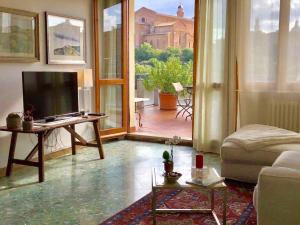 A television and/or entertainment centre at Attico San Francesco