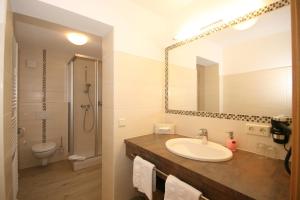 Koupelna v ubytování Alpenhotel Neuwirt