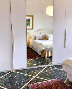 A bed or beds in a room at Attico San Francesco