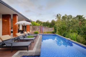 The swimming pool at or near Nadira Bali Villa