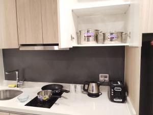 A cozinha ou kitchenette de 2BDR in Water Resort close to WalkingStreet