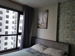 Postel nebo postele na pokoji v ubytování 芭提雅THE BASE海景度假酒店（可以安排接机服务和一切旅游安排）