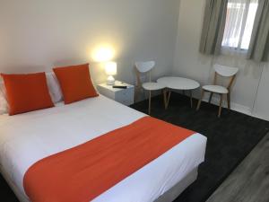 Postel nebo postele na pokoji v ubytování Sturt Motel
