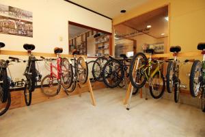 a group of bikes on display in a store at COCORETO The Guesthouse Daikon Island in Matsue