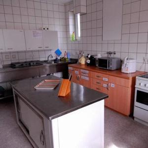 Kuchyň nebo kuchyňský kout v ubytování Gästehaus zur Linde