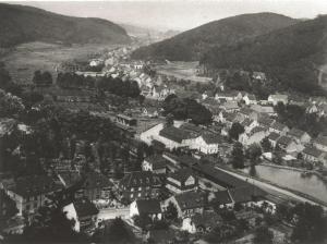 an old black and white photo of a town with houses at DIE Mansarde ! in Saarbrücken