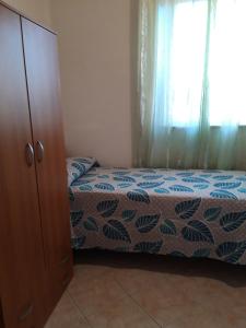 Posteľ alebo postele v izbe v ubytovaní La Casa Di Donato E Maria