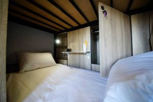 Postel nebo postele na pokoji v ubytování Yes, Sir Homestay 2