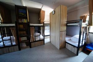 Postel nebo postele na pokoji v ubytování Yes, Sir Homestay 2