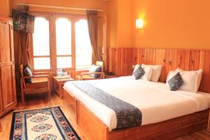 Postelja oz. postelje v sobi nastanitve Hotel Khamsum