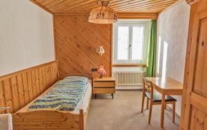 Posteľ alebo postele v izbe v ubytovaní Hotel Bernina Hospiz
