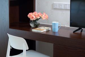 Fotografie z fotogalerie ubytování Care Residential Hotel v destinaci Chaj-kchou