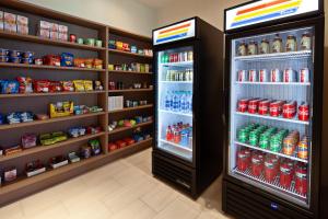 a store with a refrigerator filled with lots of drinks at Holiday Inn Express Hotel & Suites Ventura Harbor, an IHG Hotel in Ventura