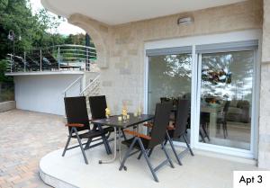 Balkoni atau teres di Villa Dragi with Pool, Sauna, & Whirlpool