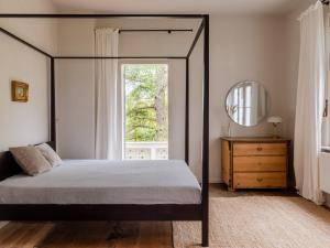Ein Bett oder Betten in einem Zimmer der Unterkunft Villa Erika