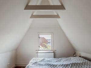 Ein Bett oder Betten in einem Zimmer der Unterkunft Villa Erika