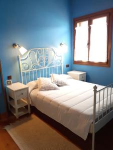 Postel nebo postele na pokoji v ubytování Casa Rural Izarrak