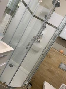 Kúpeľňa v ubytovaní Apartament „Ogrodowa” + 2 fotografie