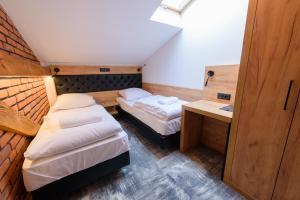 Posteľ alebo postele v izbe v ubytovaní Lord Jack Apartments