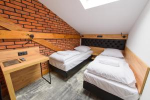 Posteľ alebo postele v izbe v ubytovaní Lord Jack Apartments
