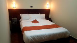 Obelisk Hotel Axum客房内的一张或多张床位